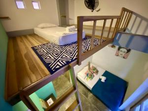 A bed or beds in a room at Imagine hostel