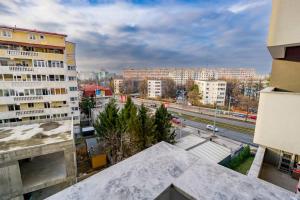 a view of a city with buildings and a street at Your New and Modern Home in Bucharest