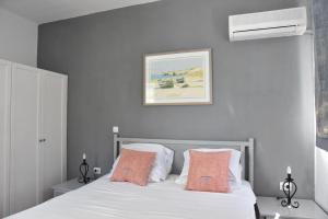 Krevet ili kreveti u jedinici u okviru objekta Boutique Hotel Tilos Mare