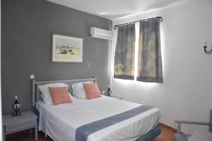 Krevet ili kreveti u jedinici u okviru objekta Boutique Hotel Tilos Mare