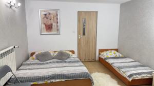 Postel nebo postele na pokoji v ubytování Agroturystyka