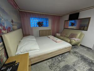 Łóżko lub łóżka w pokoju w obiekcie Motel DRABEK