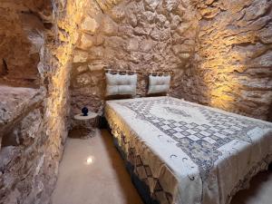 Postel nebo postele na pokoji v ubytování I Trulli di Giorgia