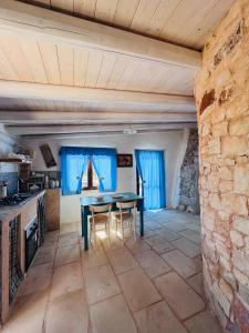 Kuchyň nebo kuchyňský kout v ubytování I Trulli di Giorgia