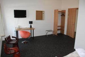 TV a/nebo společenská místnost v ubytování Höfn Inn Guesthouse