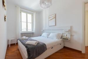 Кровать или кровати в номере Milan Retreats