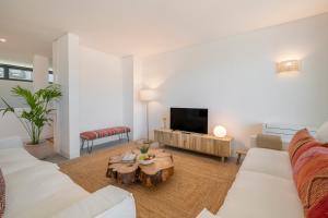 Μια τηλεόραση ή/και κέντρο ψυχαγωγίας στο CASA DO MIRADOURO 6 by Heart of Funchal +23 φωτογραφίες