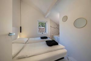 Postel nebo postele na pokoji v ubytování App 301 Palazzo Cavour