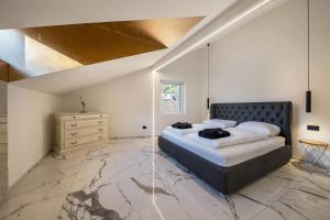Postel nebo postele na pokoji v ubytování App 301 Palazzo Cavour