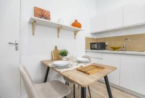 Kuchyňa alebo kuchynka v ubytovaní ®Le Cosy - Studio de charme