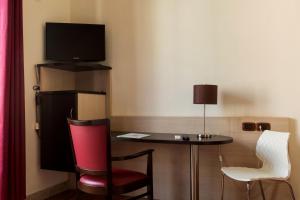 TV a/nebo společenská místnost v ubytování Hotel Sant'Elia