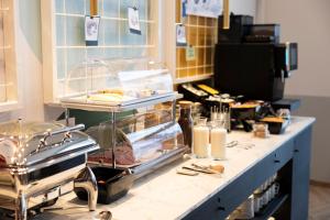 Kuchyň nebo kuchyňský kout v ubytování B&B HOTEL Mechelen