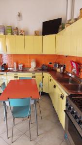 Η κουζίνα ή μικρή κουζίνα στο Casa Retrò +14 φωτογραφίες