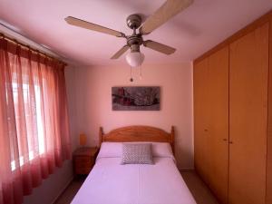 Posteľ alebo postele v izbe v ubytovaní TETOM PRIMERA LINEA DE PLAYA + 30 fotografií