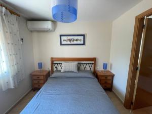 Posteľ alebo postele v izbe v ubytovaní TETOM PRIMERA LINEA DE PLAYA
