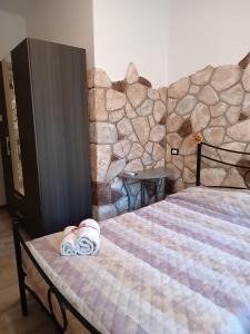 Postel nebo postele na pokoji v ubytování Rocca Pinta Guest House