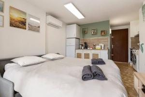Posteľ alebo postele v izbe v ubytovaní T2 cabine Le Corail du Cap proche plage WIFI
