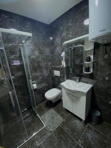 Koupelna v ubytování Apartments Graz