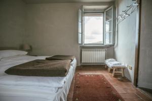 Postel nebo postele na pokoji v ubytování Albergo La Pietra