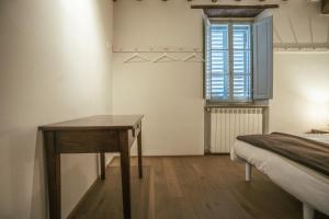 Postel nebo postele na pokoji v ubytování Albergo La Pietra