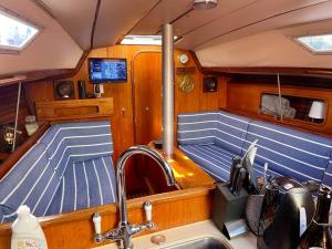 a view of the inside of a boat with a sink at The Boat House, Woodbridge, Suffolk in Woodbridge
