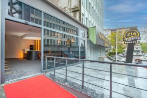 a red carpet on a walkway in front of a building at 216 Center Suite in Istanbul