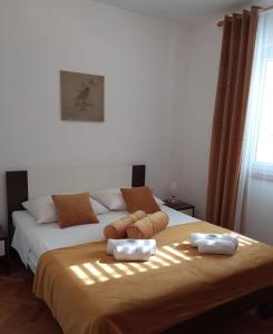 Posteľ alebo postele v izbe v ubytovaní Mar-ta Holiday Home