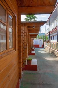 a hallway of a building with a row of windows at APARTAMENTOS PALASIET in Benidorm