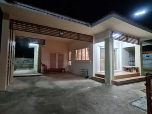 a house being remodeled with a large living room at KANA Homehug in Ban Nong Hin