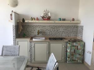 Kuchyň nebo kuchyňský kout v ubytování Casa Ludovica