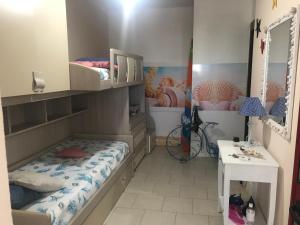 Postel nebo postele na pokoji v ubytování Casa Ludovica