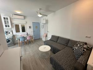 Posedenie v ubytovaní Apartamento con jardín privado