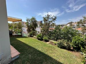 Vonkajšia záhrada v ubytovaní Apartamento con jardín privado