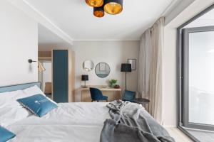 Postel nebo postele na pokoji v ubytování Living Ascona Boutique Hotel