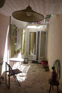 Posedenie v ubytovaní Appartement complet - Salles sous Bois