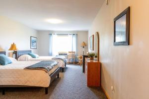 Ένα ή περισσότερα κρεβάτια σε δωμάτιο στο Waterton Country Villas