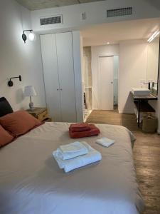 Posteľ alebo postele v izbe v ubytovaní A1 Magnifique appt 6 personnes Lofts de Ste Lucie