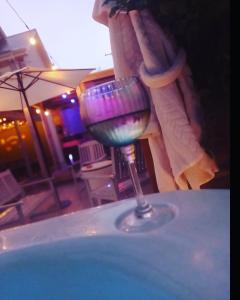 a wine glass sitting on top of a table at Bundoran seclusion in Bundoran