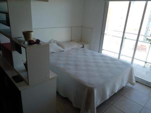 Un pat sau paturi într-o cameră la Vista al mar