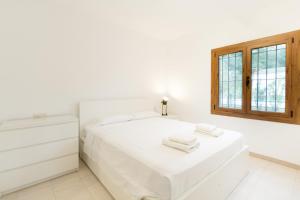 Postel nebo postele na pokoji v ubytování Casa La Calma + 37 fotografií