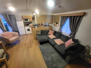 an aerial view of a living room with a couch at Vacation Escape - Valley Farm -Clacton-on-sea - Holiday Park in Clacton-on-Sea