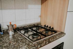 Cucina o angolo cottura di Casa Elena - casa vacanze Napoli centro