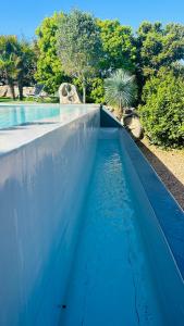 Bazén v ubytovaní Villa Porto-vecchio 4 chambres avec piscine alebo v jeho blízkosti