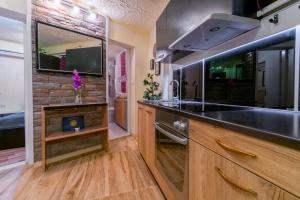 Kuchyňa alebo kuchynka v ubytovaní Apartments Villa Tomaš