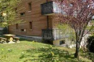 Vonkajšia záhrada v ubytovaní Appartement cosy avec lits faits à l'arrivée