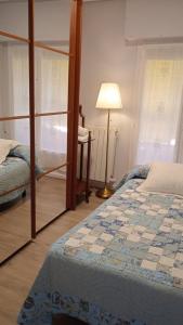 A bed or beds in a room at Piso céntrico ideal