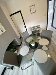 an overhead view of a glass table and chairs at CODE Terrace Oulton Broad Suffolk in Oulton