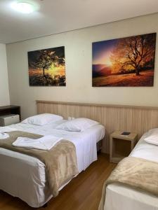 Ένα ή περισσότερα κρεβάτια σε δωμάτιο στο Hotel San Lucas