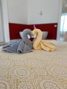 Posteľ alebo postele v izbe v ubytovaní Casa di Rita