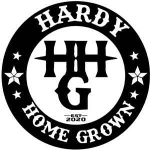 a black and white circle logo with the words harry home grown at Goin Bonanza Glamping Ranch in Hardy